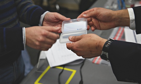 A smartcard is handed over